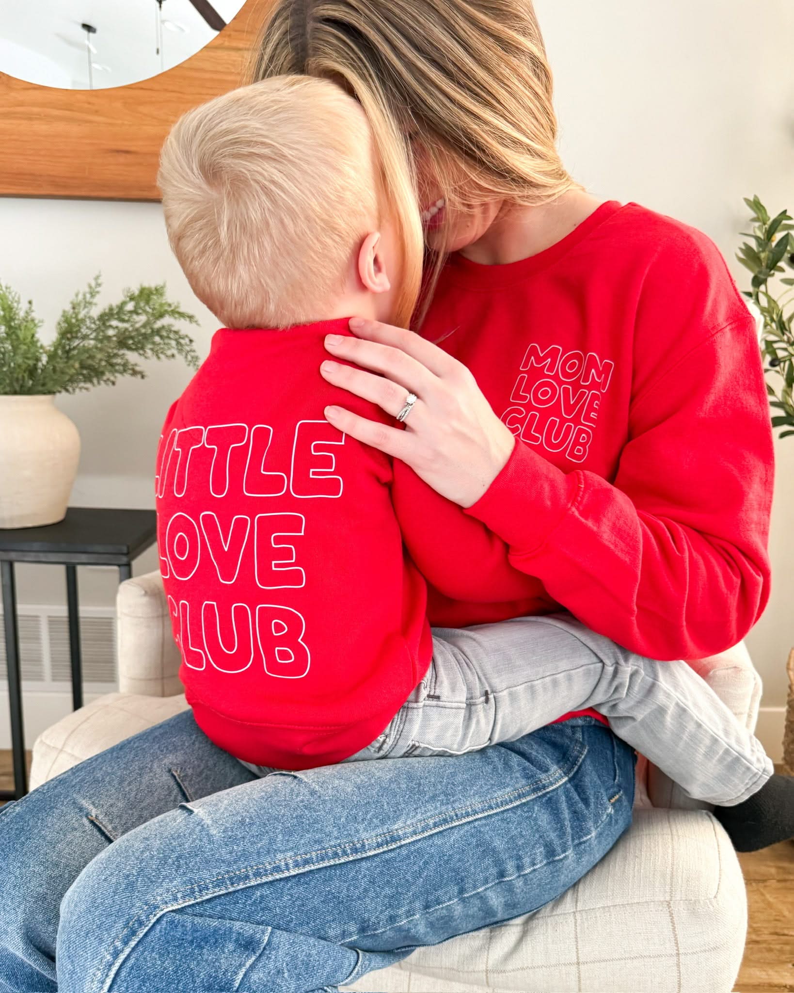 Adult and Child sweater in red with "Little Love Club" and "Mom Love Club" bubble letter text design on front left chest and back, shown on model – Little Mama Shirt Shop
