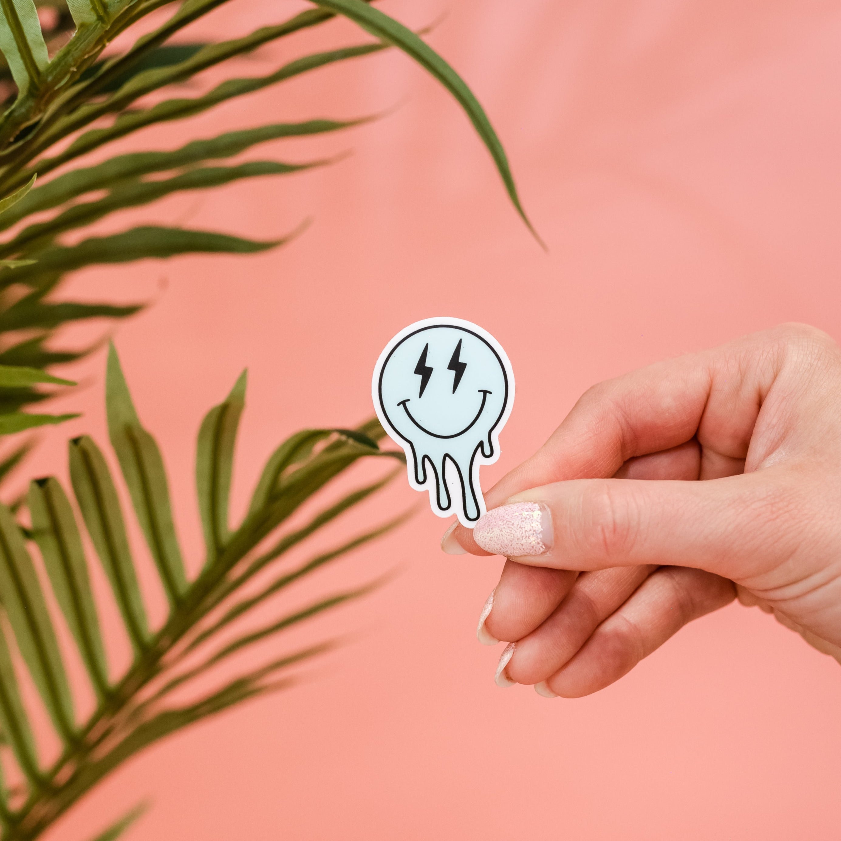 LMSS® STICKER - Lightning Eye Melting Smiley (Light Blue) Little Mama Shirt