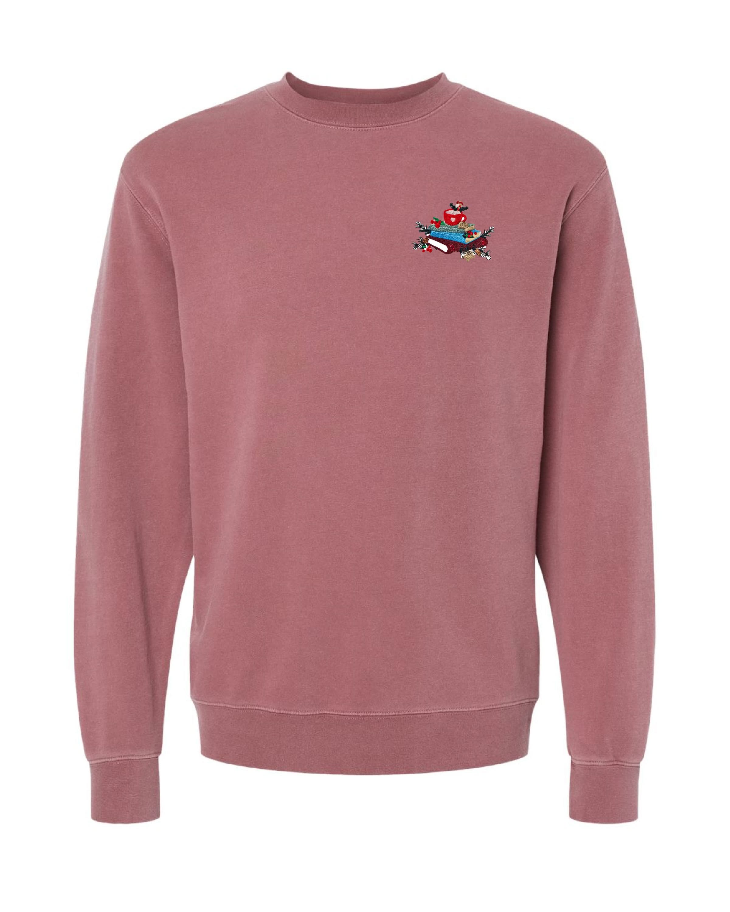 crewneck in maroon with embroidered stack of books on front, shown on flat lay – Little Mama Shirt Shop