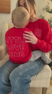 Video of Adult and Child sweater in red with "Little Love Club" and "Mom Love Club" bubble letter text design on front left chest and back, shown on model – Little Mama Shirt Shop